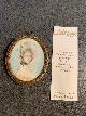  , Attractive miniature portrait of a woman with a hat with feathers and in beatiful dress painted on ivory.
