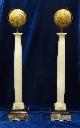  GLOBES, A pair of decorative globes on alabaster and marble column stands.